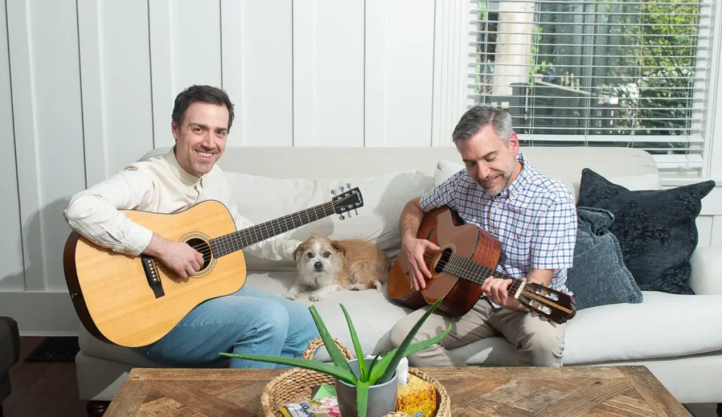 Teaching Chris a beginner guitar lesson