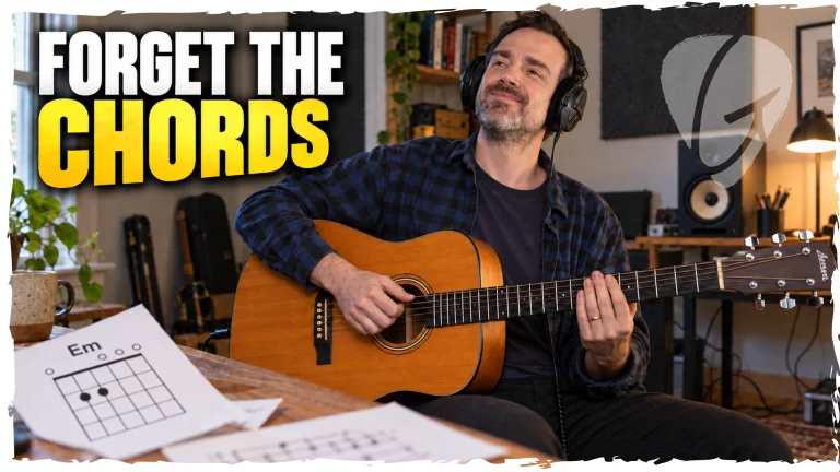 James from Good Guitarist demonstrating a muted strumming exercise on guitar